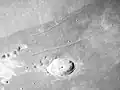 Vue oblique d'Apollo 17 orientée au sud, et montrant à la fois le cratère Plinius et Plinius Rilles.