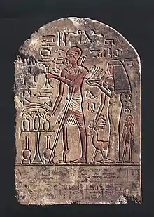 Sur une surface colorée se détachent une femme et un homme, ce dernier tient une longue bâton et sa jambe droite est atrophiée.