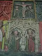 Retable de l'église (détail) : le calvaire et l'Annonciation.