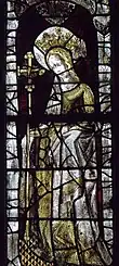 Photographie d'une lancette de vitrail représentant sainte Marguerite d'Antioche ou sainte Hélène