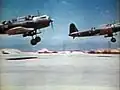 Deux Vindicator décollant de l'archipel de Midway en juin 1942 pour affronter la marine impériale japonaise.