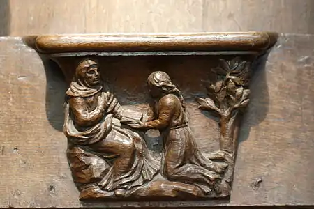 Stalle de l'église de Saint-Sulpice-de-Favières, XIVe – XVe&nbsp;siècle.