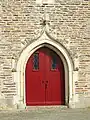 Église Sainte-Colombe : la porte d'entrée située à l'est.