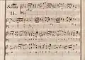 partition manuscrite rehaussée de couleurs passées rouge et bleu en bordures
