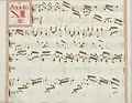 partition manuscrite aux couleurs passées vert et rouge en bordures et cadre de titre, titre en rouge