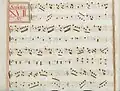 partition manuscrite rehaussée de couleurs passées rouge et vert en bordures et cadre du titre, titre en rouge