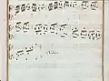 partition manuscrite rehaussée de couleurs passées rouge et bleu en bordures