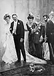 Theodore Roosevelt avec des ambassadeurs s'amusent du chat Slippers.