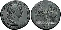 Sesterce frappé après 114 montrant au verso Trajan, accompagné d'officiers, être acclamé imperator pour la huitième fois (IMPERATOR VIII SC).