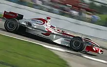Photo de Takuma Satō sur la SA05 au GP des États-Unis 2006