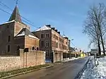 Le château du Parc (XVIIIe&nbsp;siècle) et sa ferme.