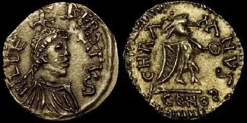 Tiers de sou d'or de Childebert&nbsp;Ier.Avers : Buste diadémé à droite, une croisette sur la tête.Revers : Victoire debout à droite tenant une couronne. Bibliothèque nationale de France.