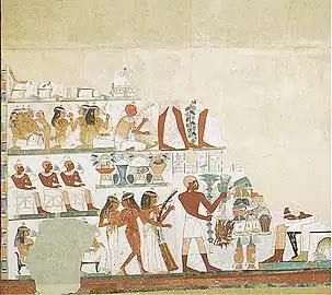 Nakht, suivi de danseuses et musiciennes