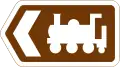Direction de l'attraction touristique indiquée par un symbole