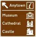 Sortie autoroutière menant à une ville ou une zone géographique proposant plusieurs attractions touristiques et un point ou centre d'information touristique.