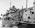 Le Mindanao a été endommagé par l'explosion du Mount Hood dans le port de Seeadler le 10 novembre 1944.