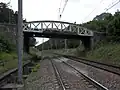 Le pont-rail de l'ancienne Ligne de Gray à Saint-Jean-de-Losne, coupant la ligne de Dijon-Ville à Vallorbe (frontière)