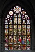 L'un des vitraux de la légende du Saint-Sacrement : scène de la profanation des hosties par des Juifs en 1370 - œuvre de Jean-Baptiste Capronnier.