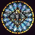 Vitrail de l'Esprit Saint (oculus de église Saint-Luc de Raon L'Étape).