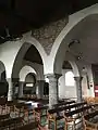 Vue sur l'unique niveau d'élévation de la nef (grandes arcades).