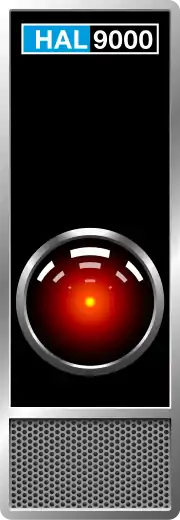 Réplique du panneau de communication de HAL, avec son capteur optique au milieu et une enceinte / microphone en basDans les films, HAL est vu observer l'activité du vaisseau grâce à des panneaux comme celui-ci, avec son capteur animé en son centre d'un point de lumière rouge, donnant l'impression d'un œil..